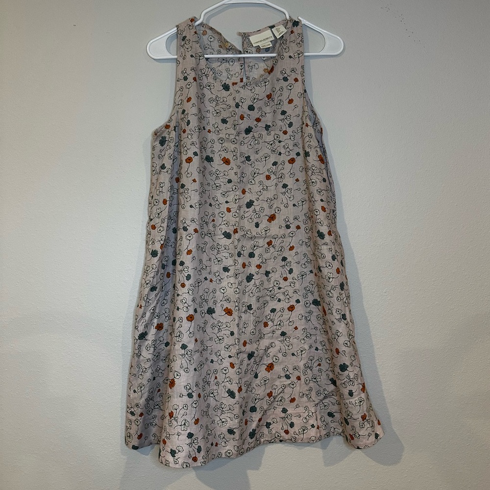 Cynthia Rowley dress in pale light purple with multicolored flowers, size small.